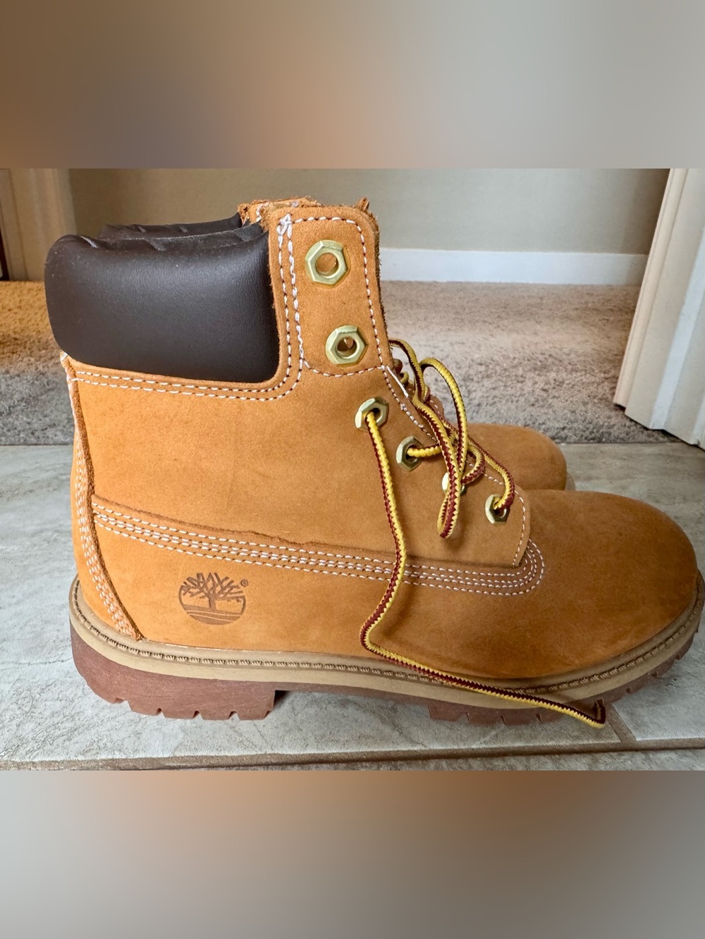 Timberland Classic Waterproof Boots- Women size 7.5 or Men size 6. Wheat color